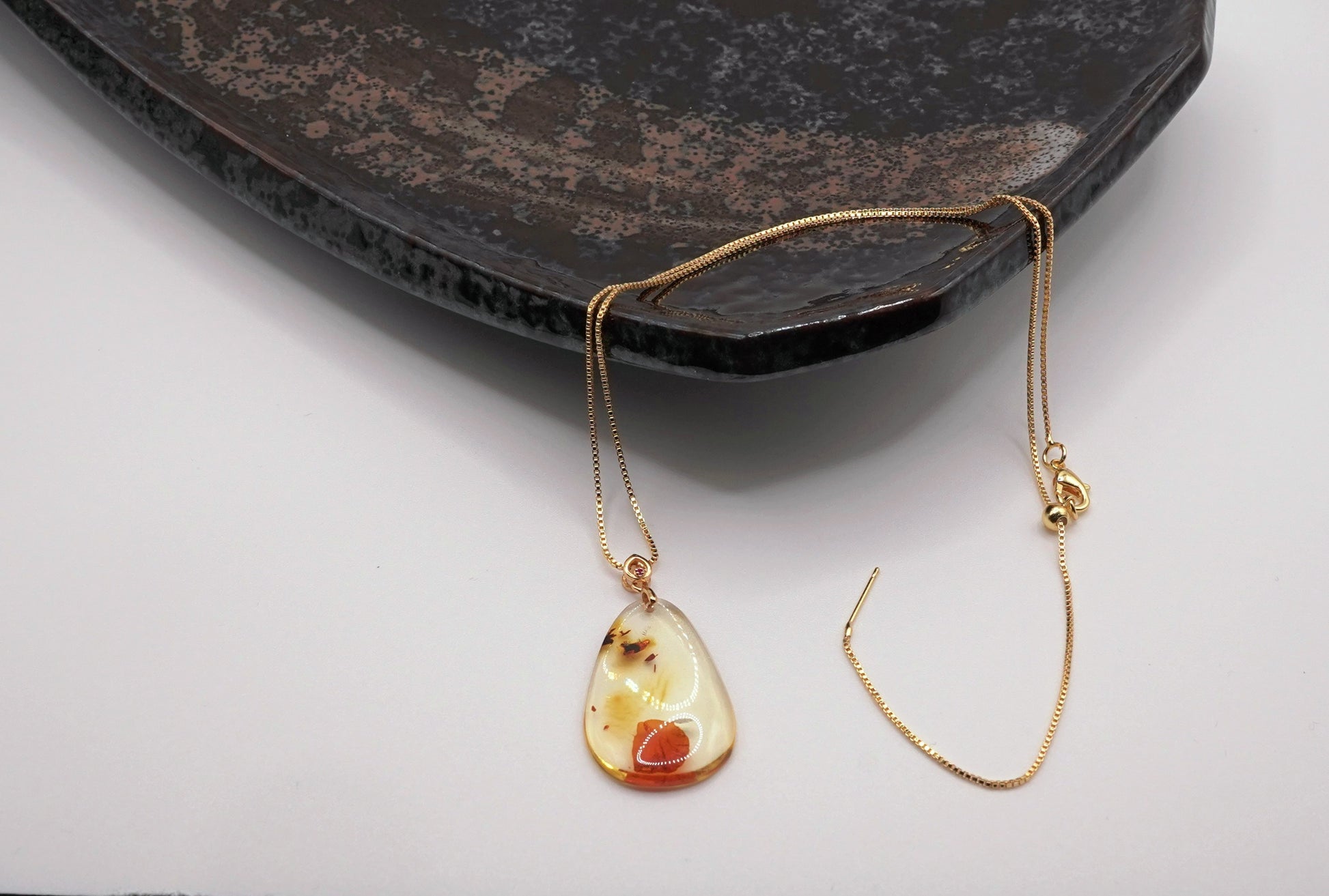 Natural Flower Amber Pendant  Botanical Resin Jewelry  Organic Elegance