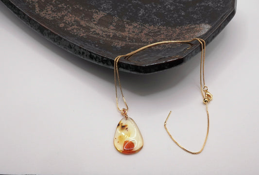 Natural Flower Amber Pendant  Botanical Resin Jewelry  Organic Elegance