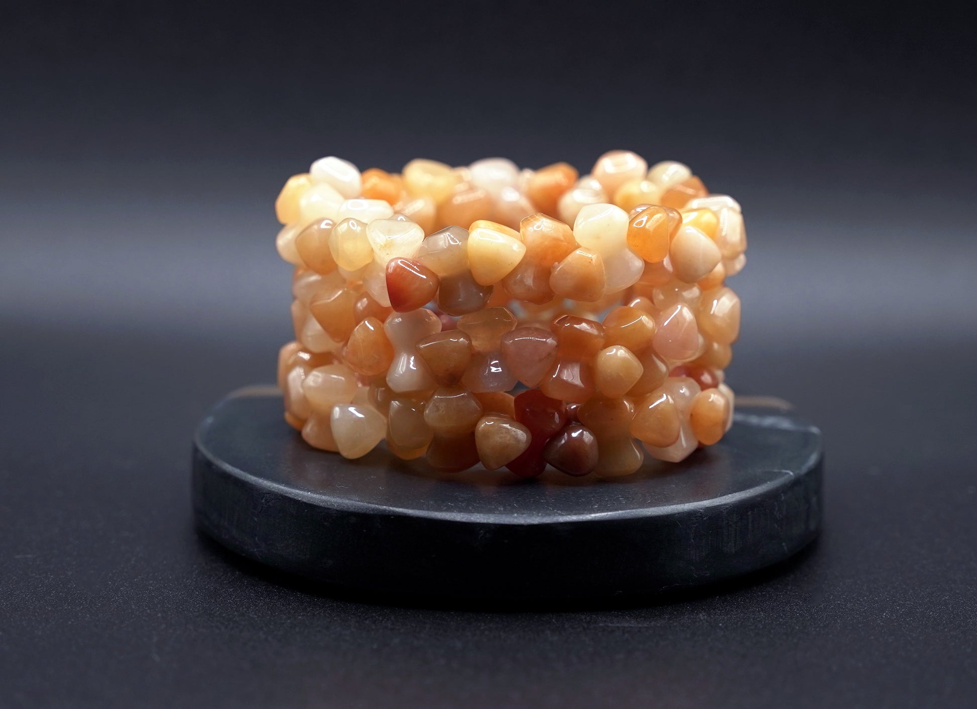 Stack of natural yellow jade nugget bead bracelets with polished finish, handmade healing crystal jewelry