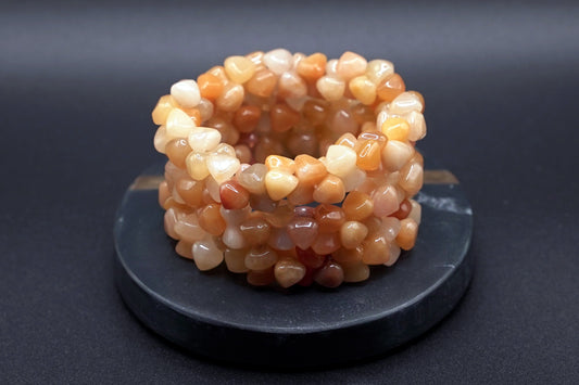 Stack of natural yellow jade nugget bead bracelets with polished finish, handmade healing crystal jewelry