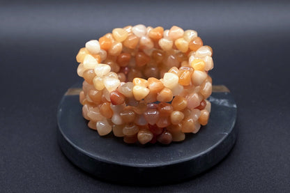 Stack of natural yellow jade nugget bead bracelets with polished finish, handmade healing crystal jewelry
